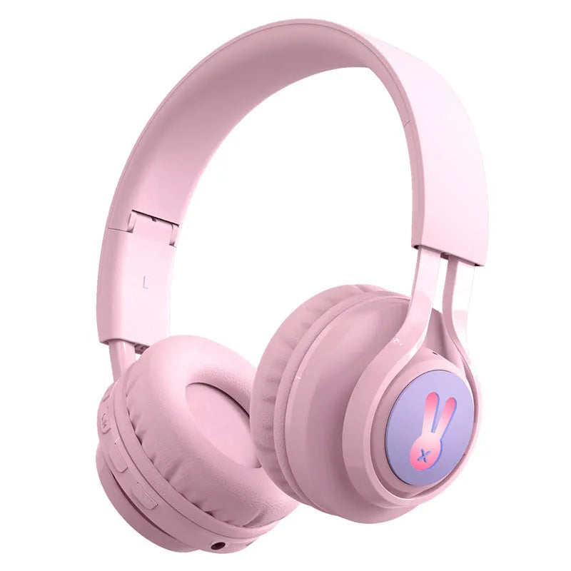 Purple wireless children's headphones with RGB bunny design showing battery display.