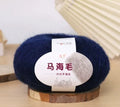Mohair DIY scarf knitting kit showing wool ball with hand-woven Inverness thread in multiple colour options