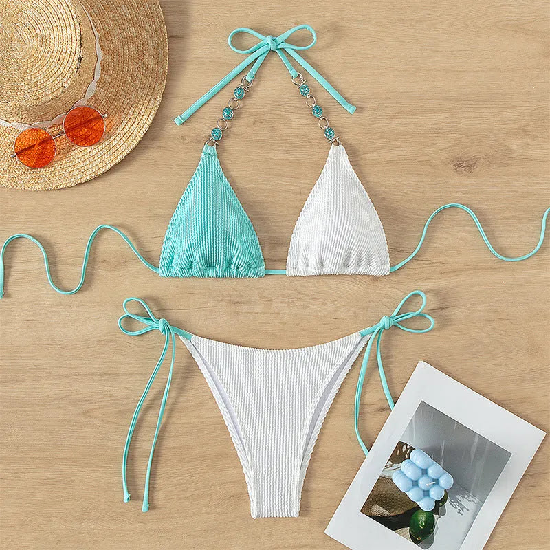 Women's colour matching bikini with lace-up front and pearl chain trim.