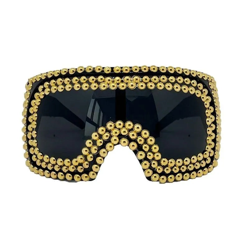 Men's punk style sunglasses with super large square rims and rivet detailing in gold colour