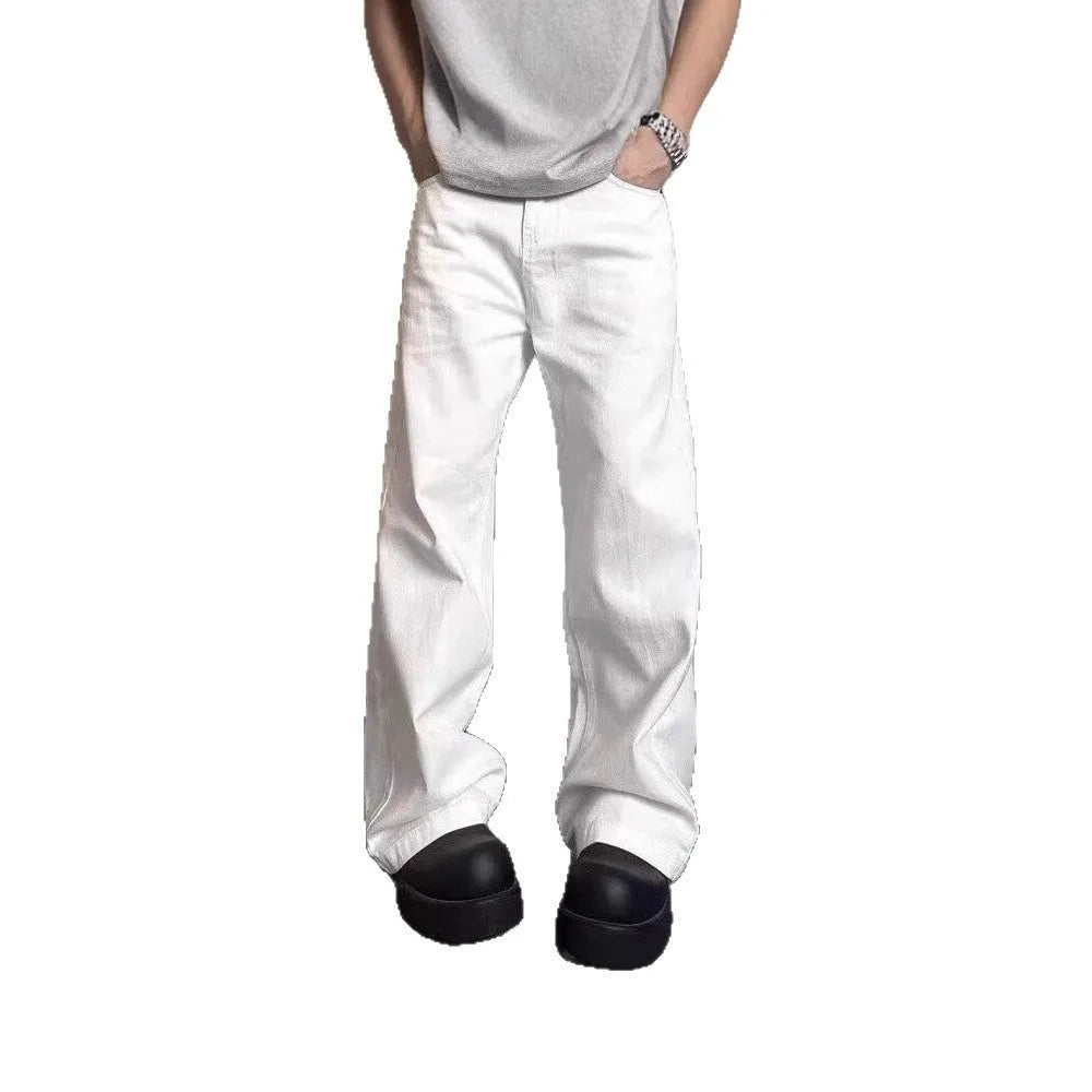 Men's white straight-leg cotton denim jeans on a hanger, showing front view with zipper fly.
