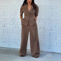 Brown men's slim fit polyester suit with long-sleeve top and matching trousers