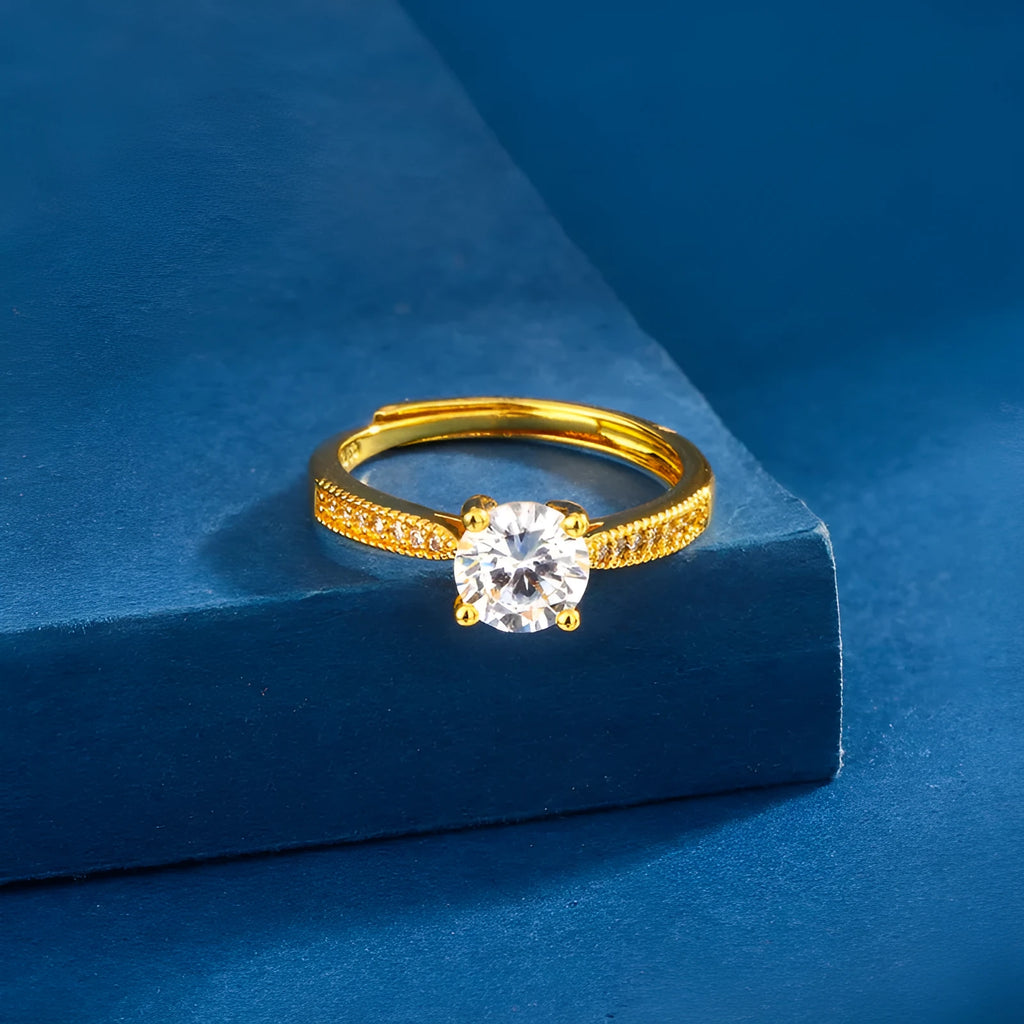 Classic four-claw ring with 1 karat eight hearts eight arrows zircon in gold colour on white background