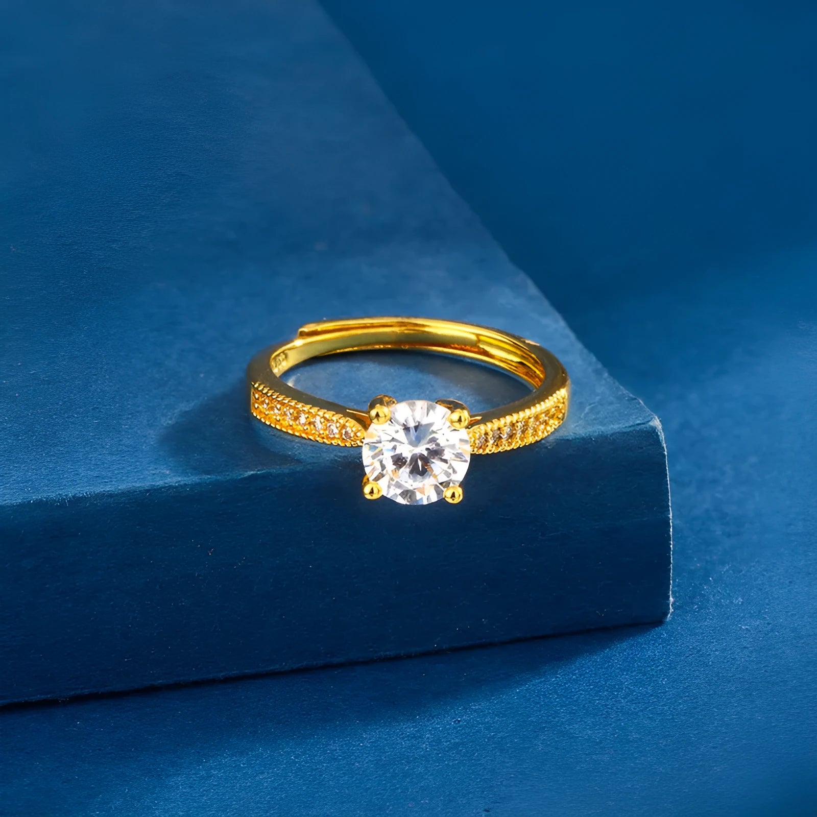 Classic four-claw ring with 1 karat eight hearts eight arrows zircon in gold colour on white background