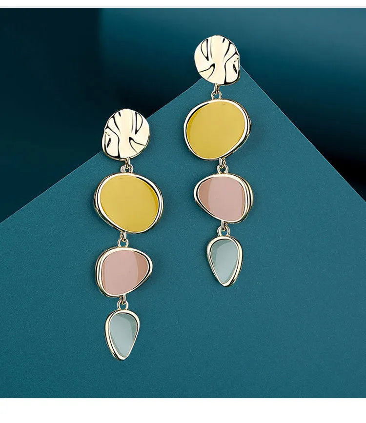 Alloy drop earrings with Morandi colours from oil drip treatment, showing simple vintage disc design.