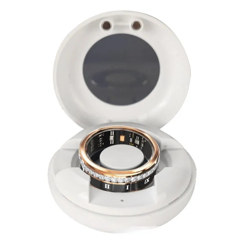 Gold and silver smart rings with diamond inlay for blood oxygen monitoring on a finger.