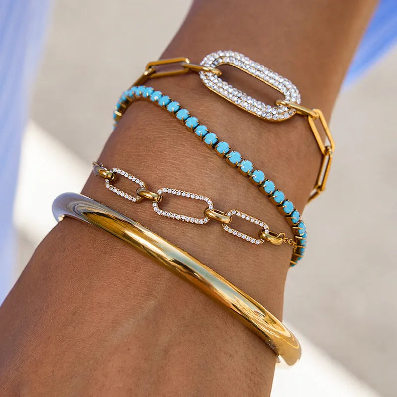 Women's stainless steel bracelet with electroplated finish, geometric round shape on a woman's wrist