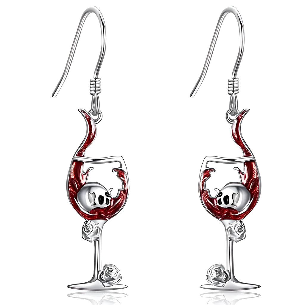 A pair of geometric skull wine glass shaped earrings with an electroplated finish.