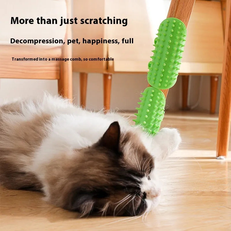 Silicone cat grooming comb with adjustable strap attached to furniture leg for scratching and hair removal