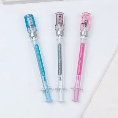 White and blue vaccine pen design gel pen with cap, shown next to a black full needle tube refill.