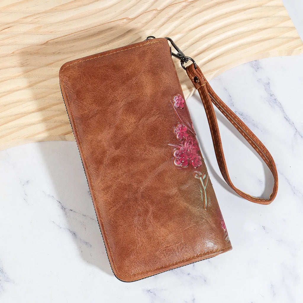 Embossed floral pattern handbag with hand-painted Chinese style zip closure in black, brown, or coffee brown colour
