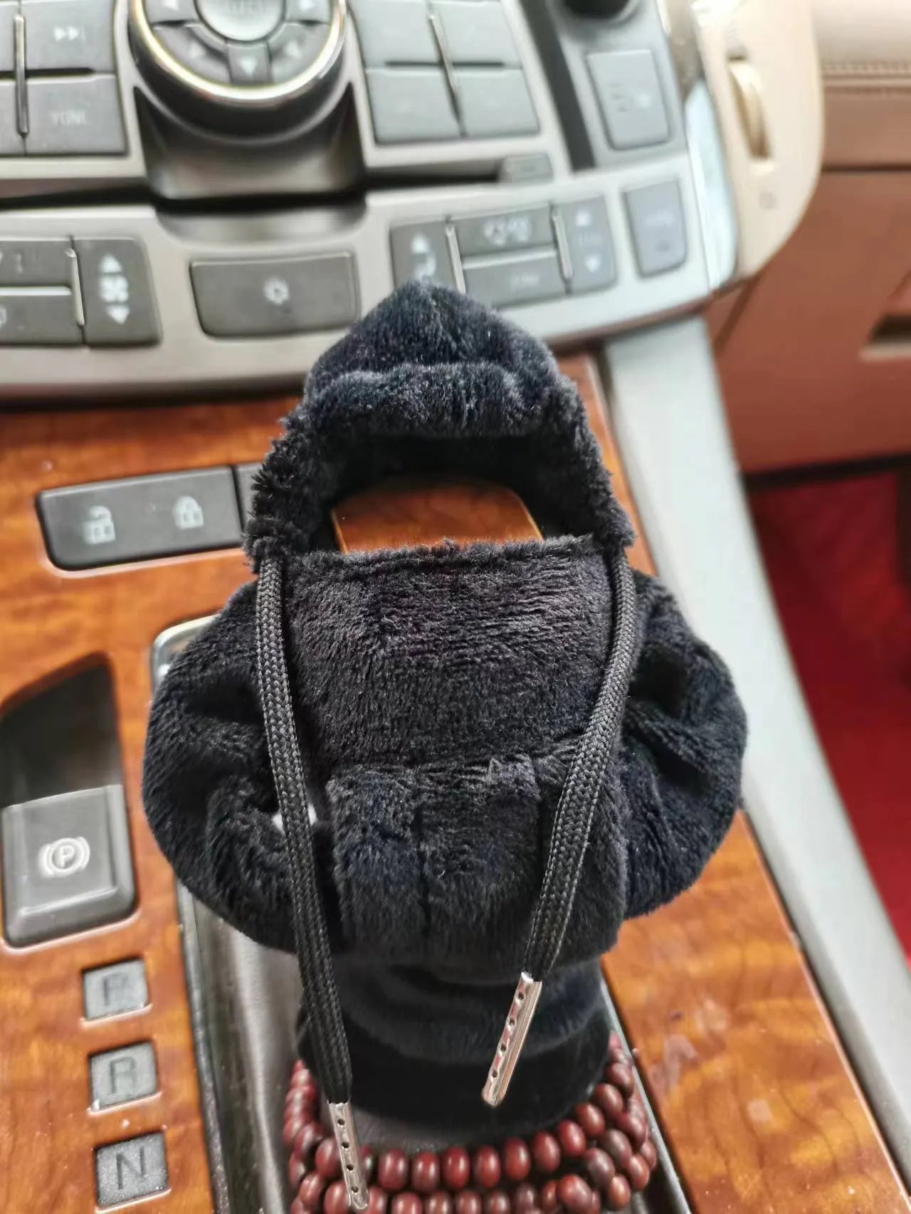 Dutch velvet car gear handle sleeve in multiple colour options on a car gear stick