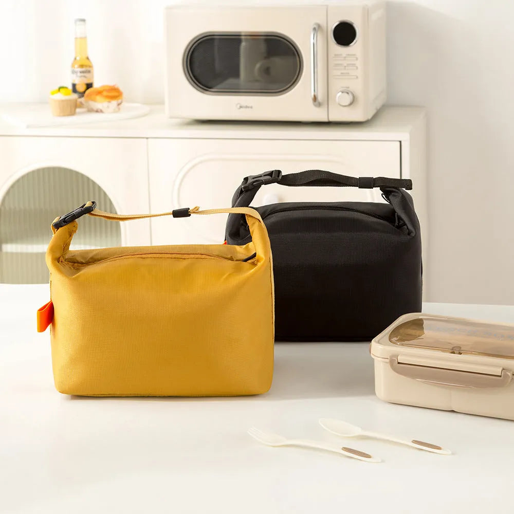 Japanese-style insulated lunch bag in oxford cloth with wide opening, shown in army green colour.