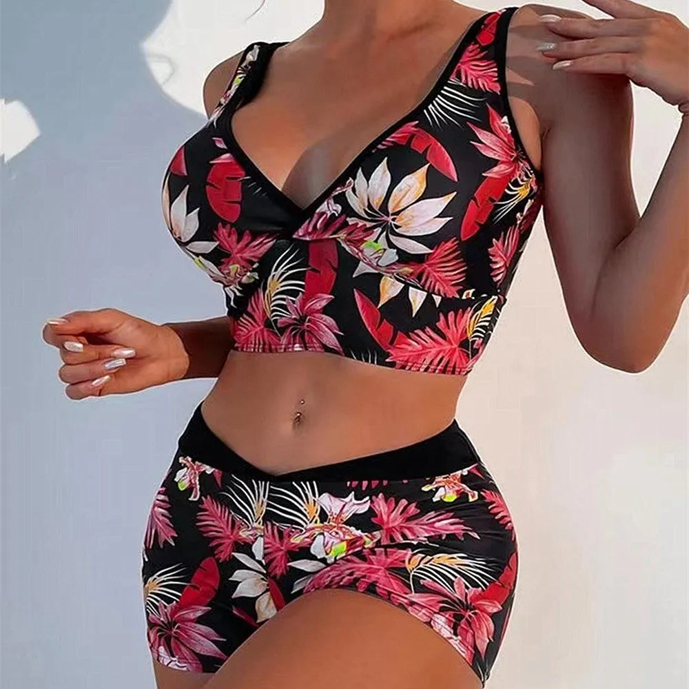 Women's two-piece swimsuit set with boxer brief bottoms in a printed design.