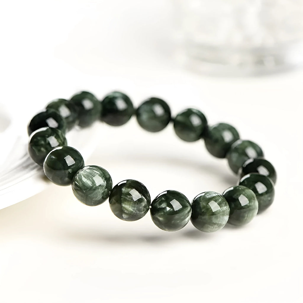 Green dragon crystal bracelet with 8-9mm round beads and geometric Ruyi design elements