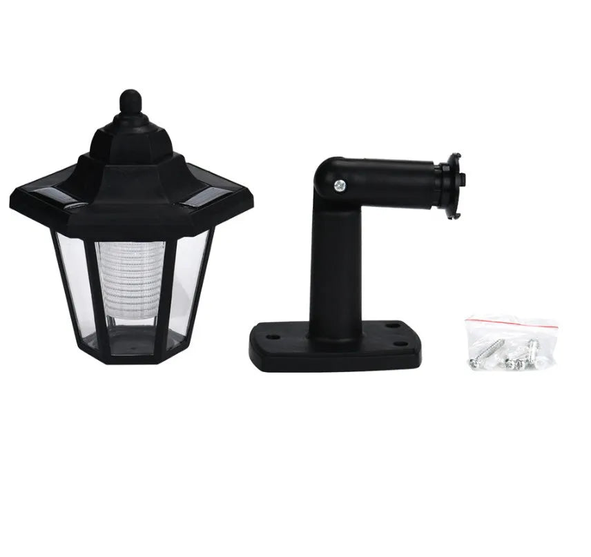 Black hexagonal solar wall lamp with automatic light sensor for outdoor garden lighting