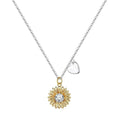 Sterling silver sunflower pendant necklace with adjustable chain on grey background