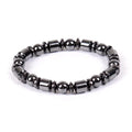 Black pentagram magnetic therapy bracelet with magnetite and hematite beads on wrist