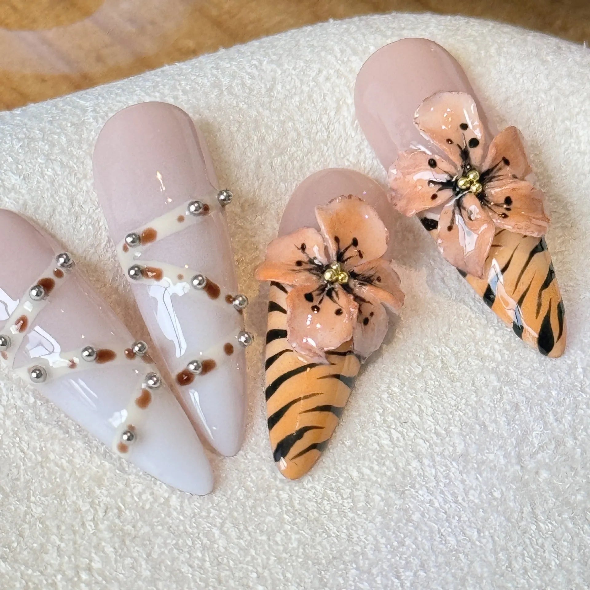 Set of ten French style nail stickers featuring leopard print, cross, and flower patterns in sizes XS, S, M, L.