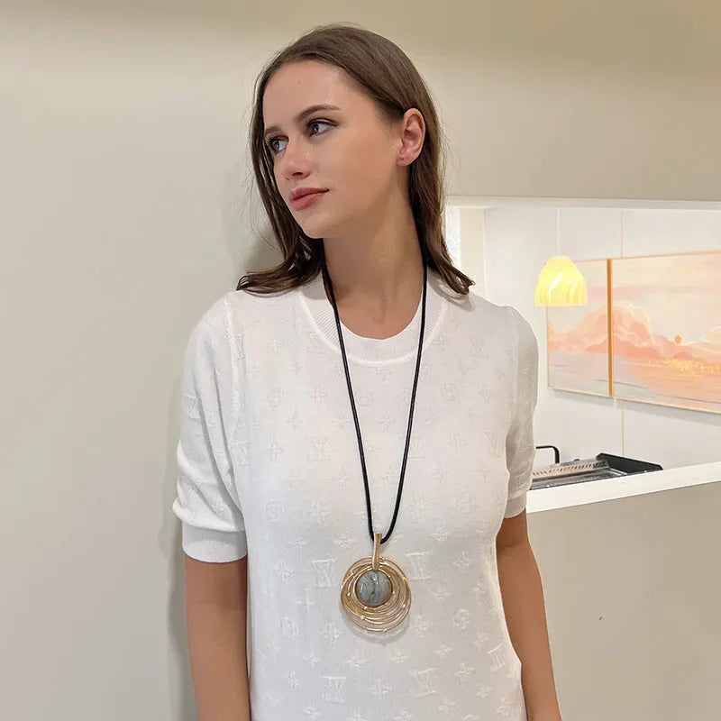 Vintage gold women's sweater chain necklace with geometric plaid pendant on snakeskin wax rope chain