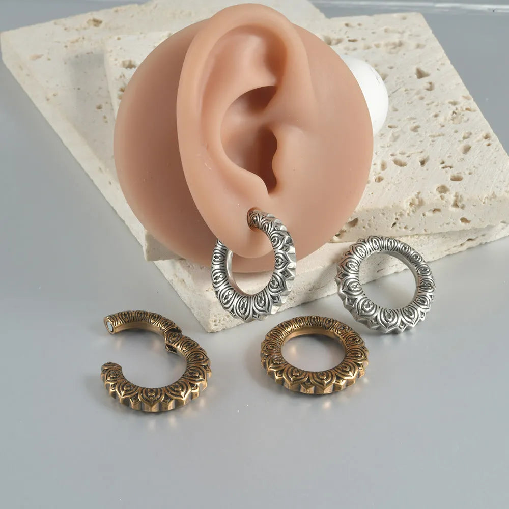 Geometric hollow earrings with antique silver dragon finish and stainless steel alloy construction