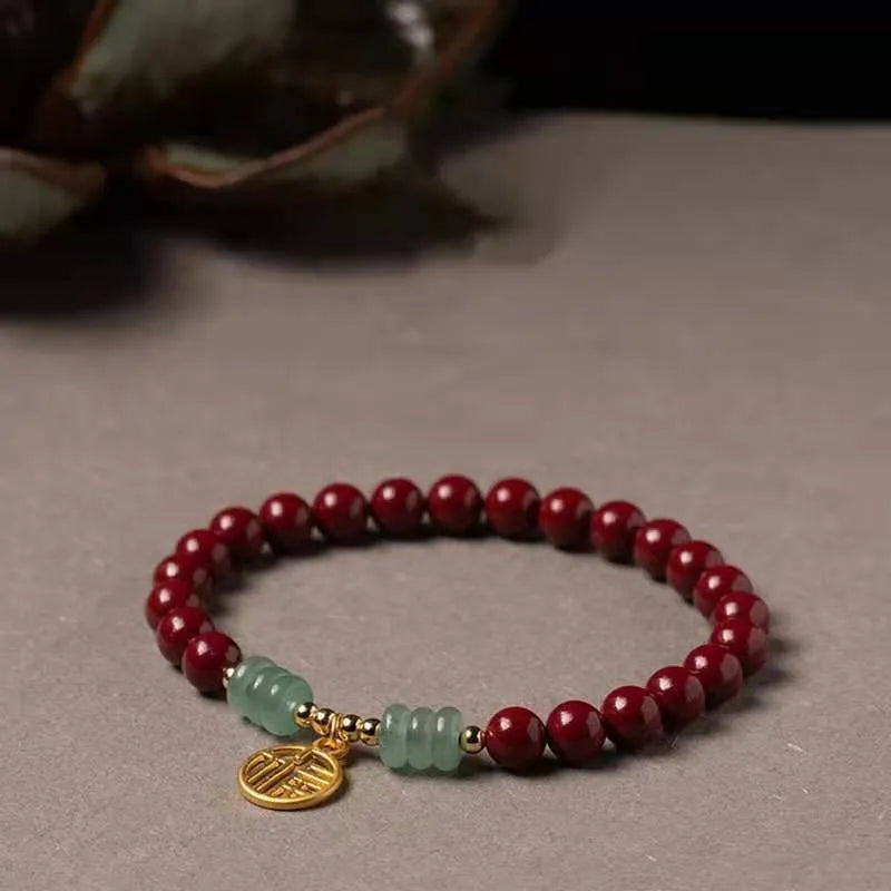 Handmade wave-shaped cinnabar and copper bead bracelet in national style.