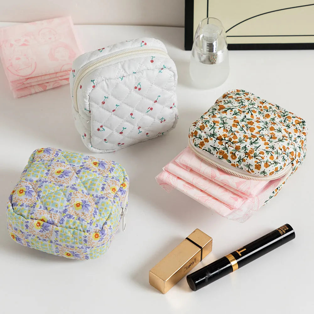 Polyester ladies key storage wallet with floral print and coin purse compartment.