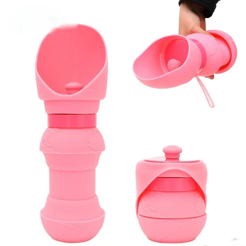 Silicone folding dog water cup shown in mint green colour, unfolded and flat.