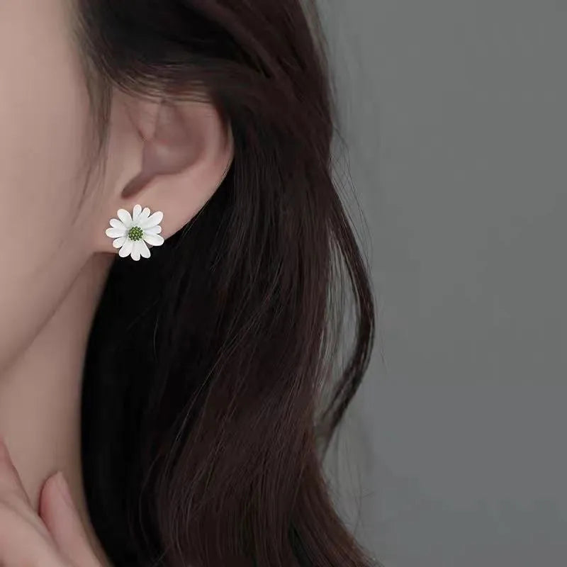 Cartoon flower stud earrings in alloy with two-tone blue and orange, white and green, or yellow and white colour combinations