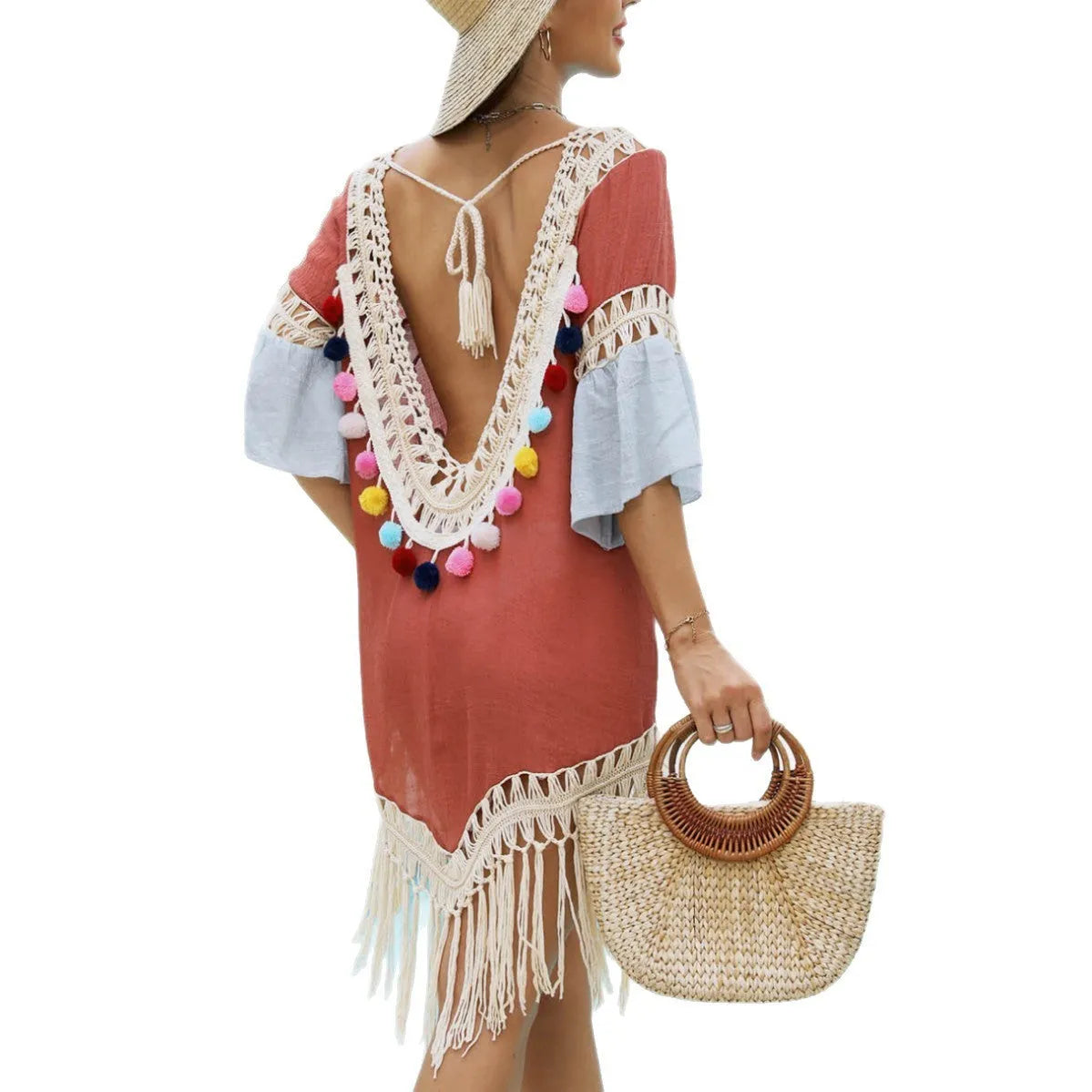 Orange floral beach overskirt with hand crochet tassels, shown as a free-size cover-up.