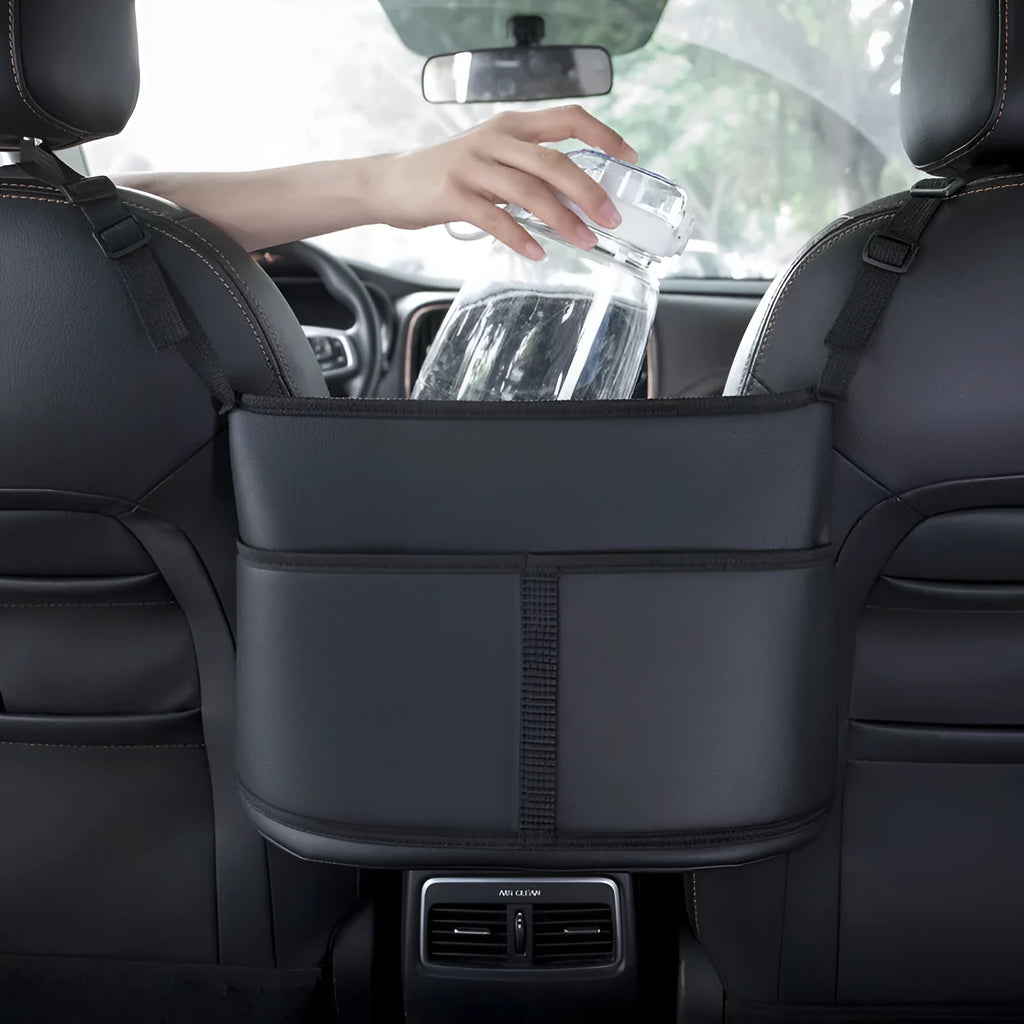 Black leather car seat storage bag with carbon fibre pattern, showing size.