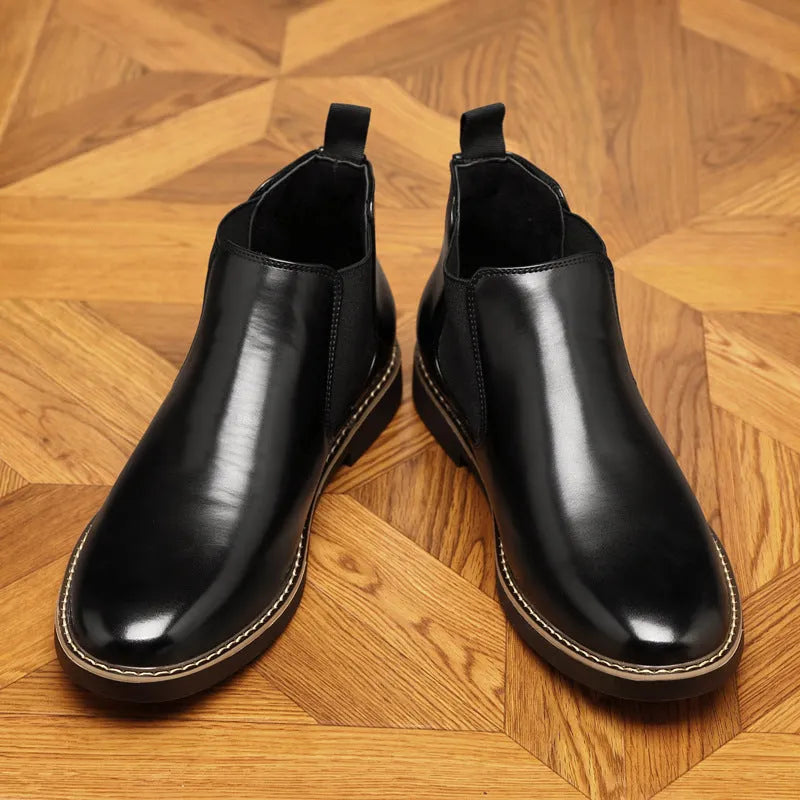 Men's black formal pointed-toe leather boots with a square heel on a white background.