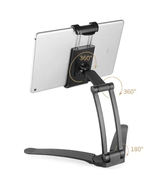 Silver aluminium alloy tablet stand holding a tablet, showing its 360-degree adjustable hinge and chuck system.