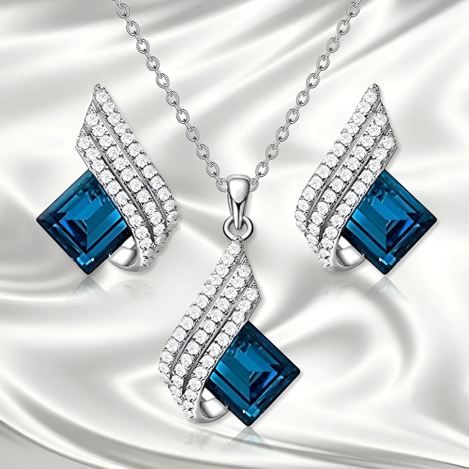 Women's necklace and earring set with glass pendant on cross chain necklace