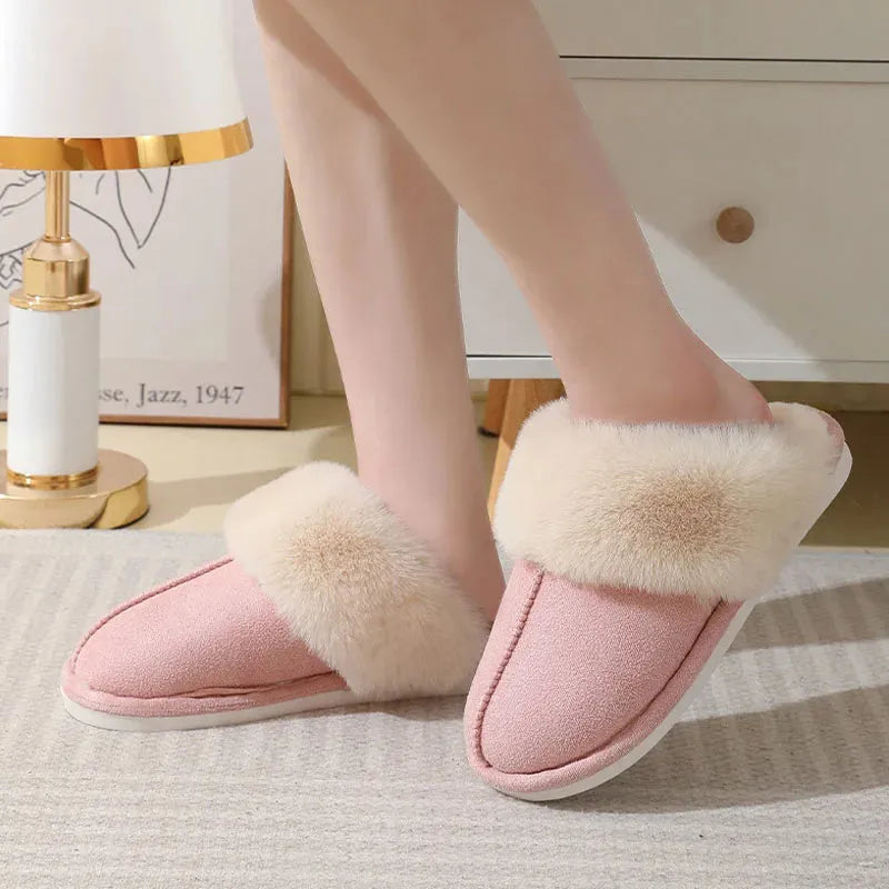 Women's brown plush indoor slippers with round toe, flat heel, and textured non-slip sole.