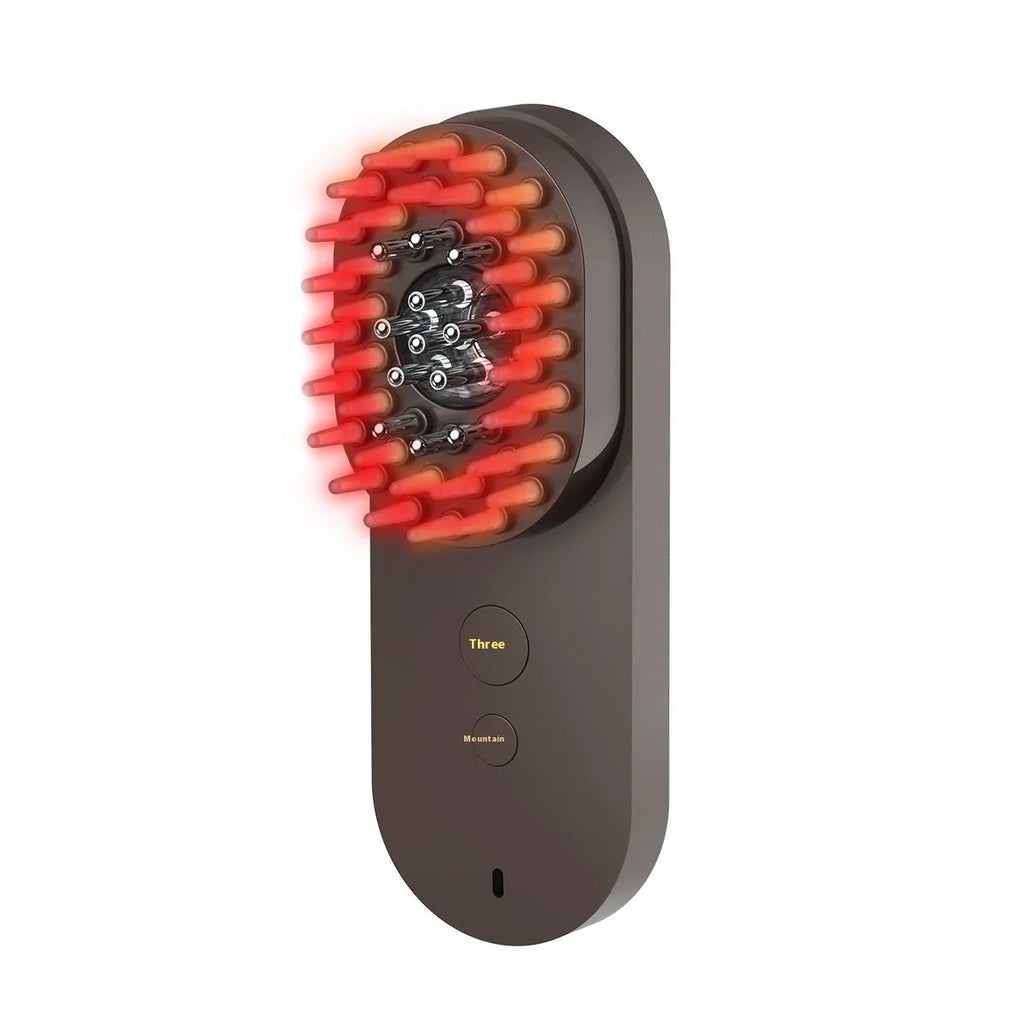 Pink and black smart massage comb for hair care with red light feature, shown next to a ruler under 10cm
