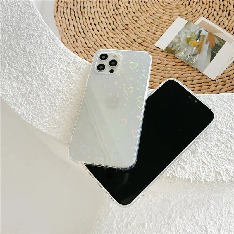 Transparent silicone iPhone case with laser-etched Love design shown on iPhone model