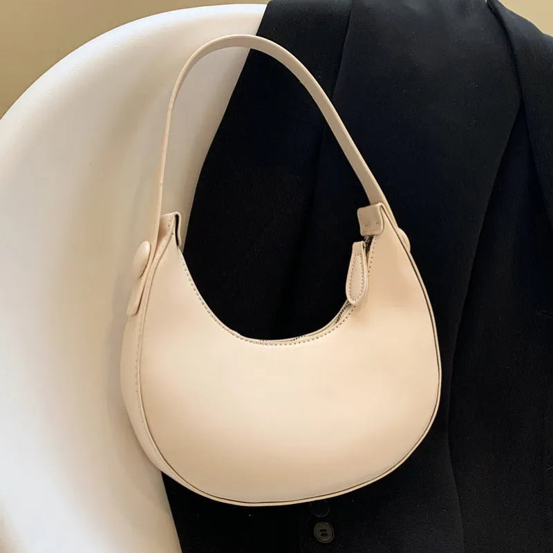 Women's retro dumpling-shaped shoulder bag in PU material with zipper organiser pocket