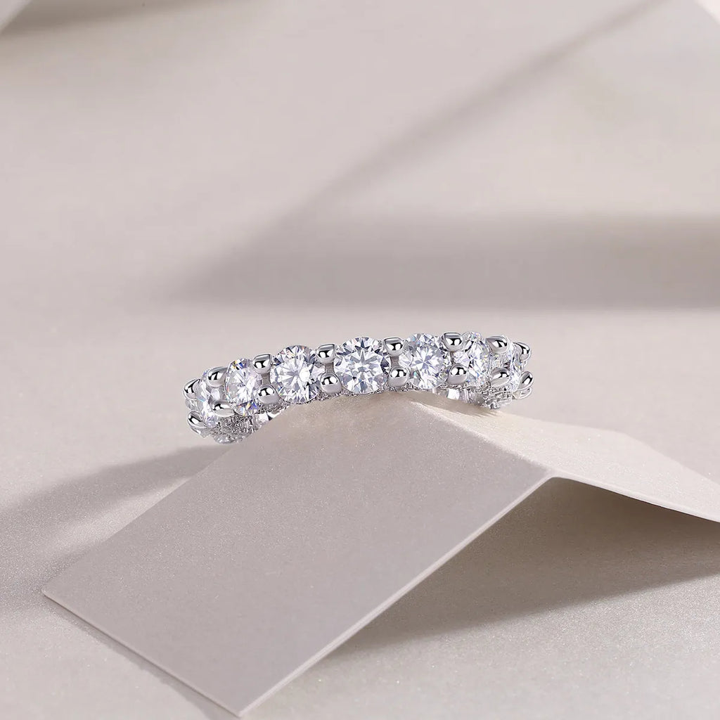 Ferris Wheel moissanite ring set in S925 silver with platinum plating on a white background