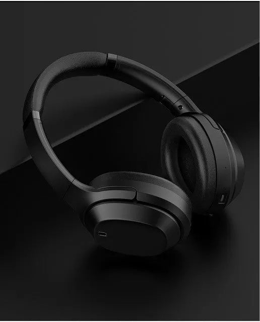 Black wireless Bluetooth headphones with memory-protein ear cushions and adjustable stainless steel headband