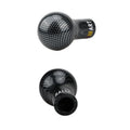 Manual automatic five-gear car gear head shifter in white, black, blue, red, and carbon fibre finishes.