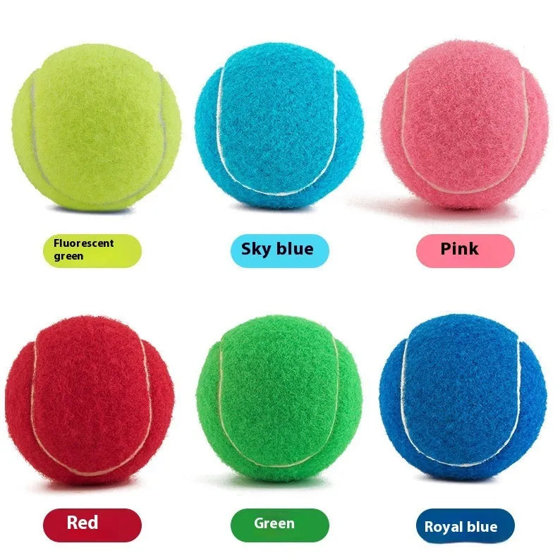 Bright pink durable rubber dog tennis ball with bite-resistant design for aggressive chewers.