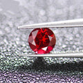 Experimental regenerated pigeon blood red ruby gemstone showing colour consistency