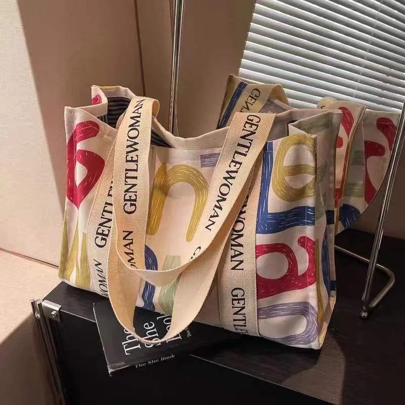 Large canvas tote bag with printed letter or pattern design for women