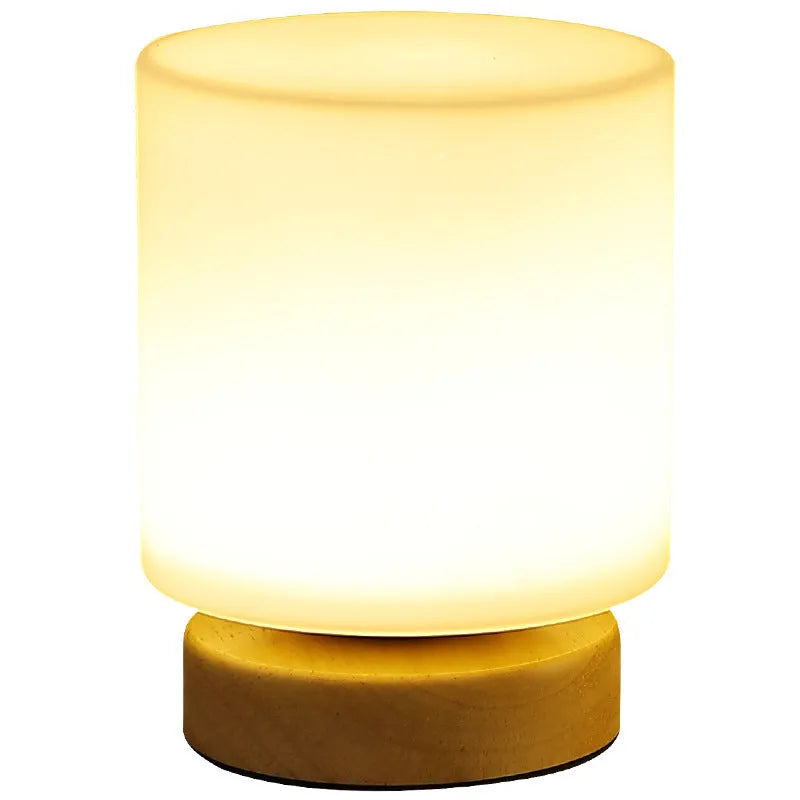 Nordic solid wood USB table lamp with touch dimming in white cube, cylinder, and ball styles on a wooden surface.
