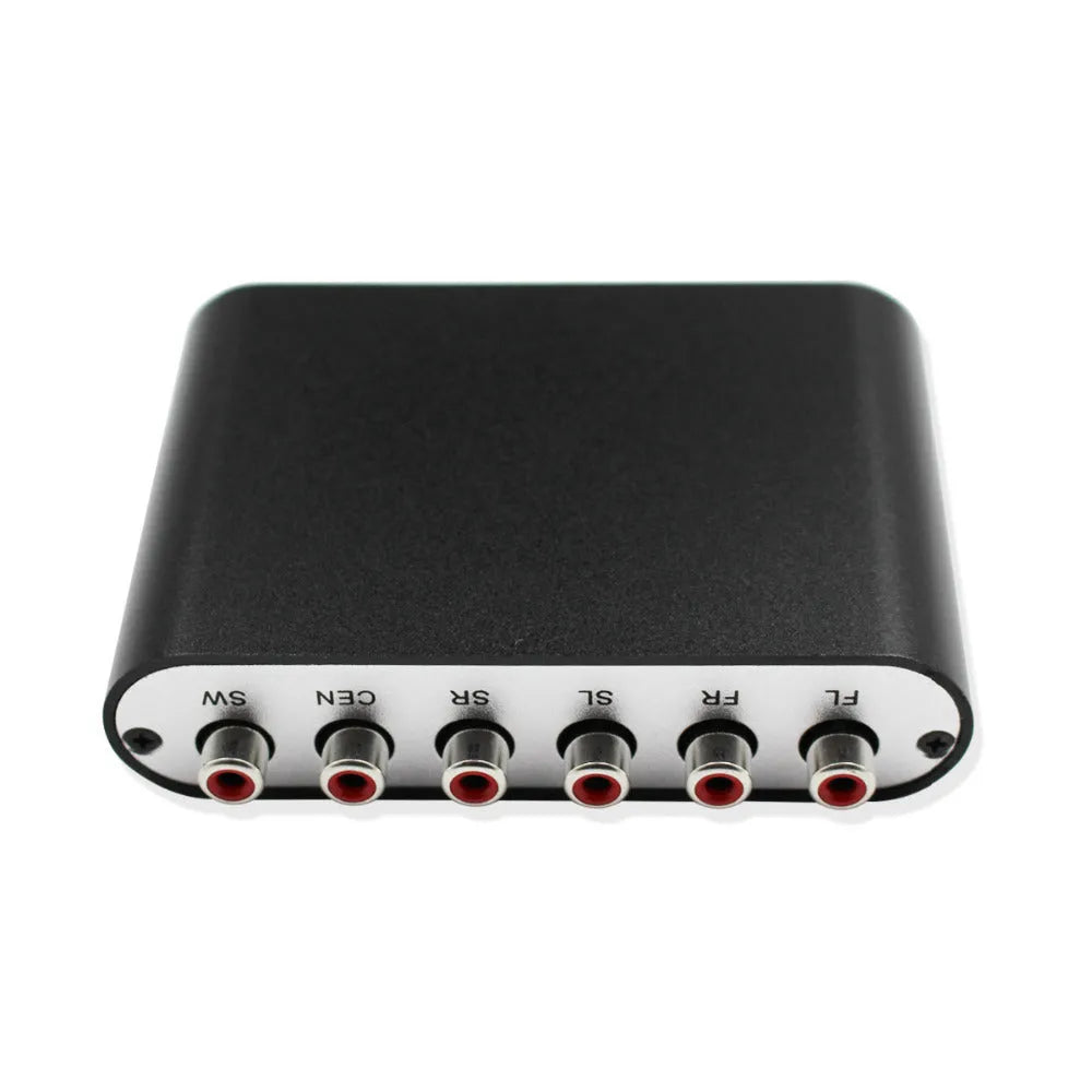 Black DTS Dolby Digital audio decoder with optical, coaxial, and analogue input ports on the rear panel.