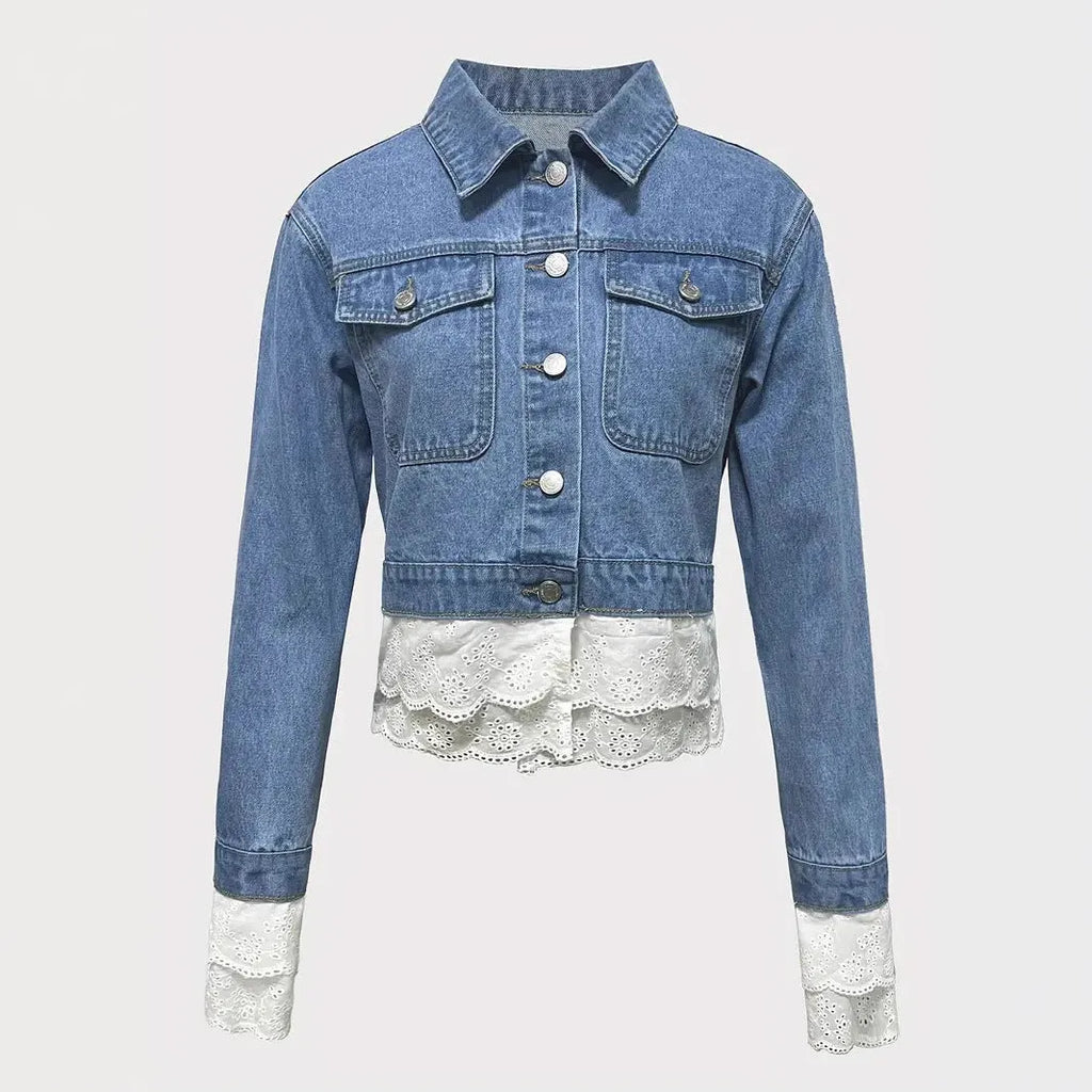 Blue women's denim jacket with lace stitching detail on the front, with long sleeves.