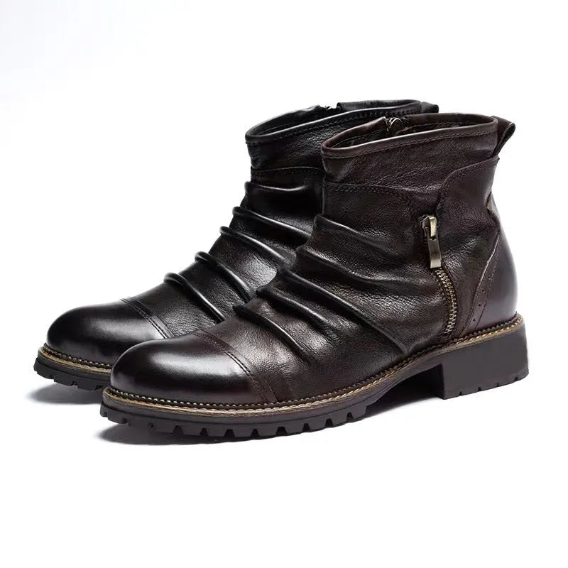 Black mid-calf cowboy boots with side zip, round toe, and embossed PU upper on a brown background.