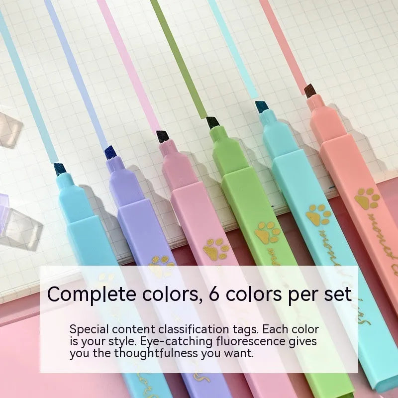 Box of six fluorescent marking pens with plastic shells and oblique nibs in assorted colours.