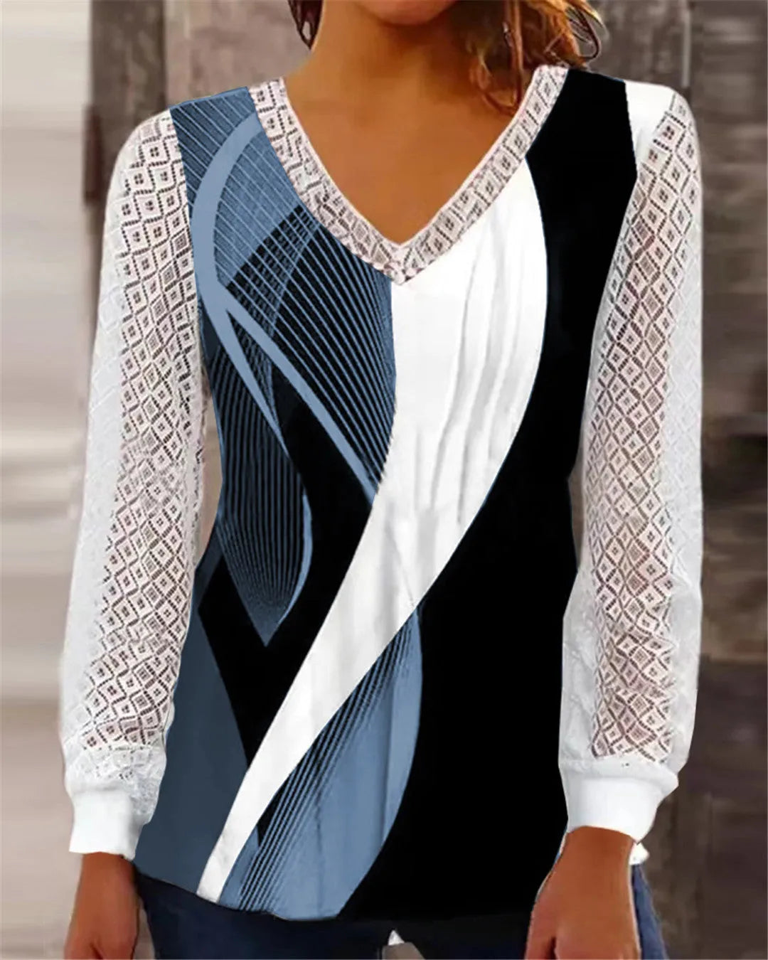 Purple loose V-neck women's top with long sleeves and a hollow-out lace print pattern.